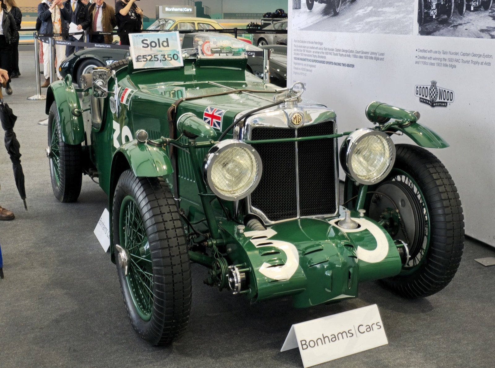 Green MG K3 Magnette with number 39 roundels on its nose, wire wheels and a Union flag on the bonnet, displayed with a sold sign on the windscreen