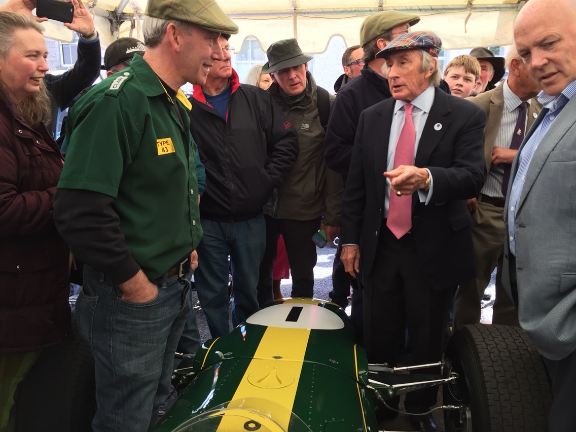 Andy Middlehurst and Sir Jackie Stewart discussing the Lotus 43